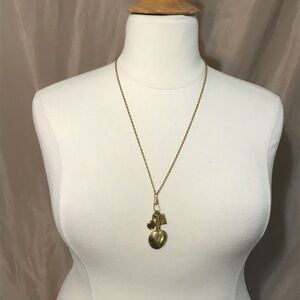 gold necklace with multiple lockets